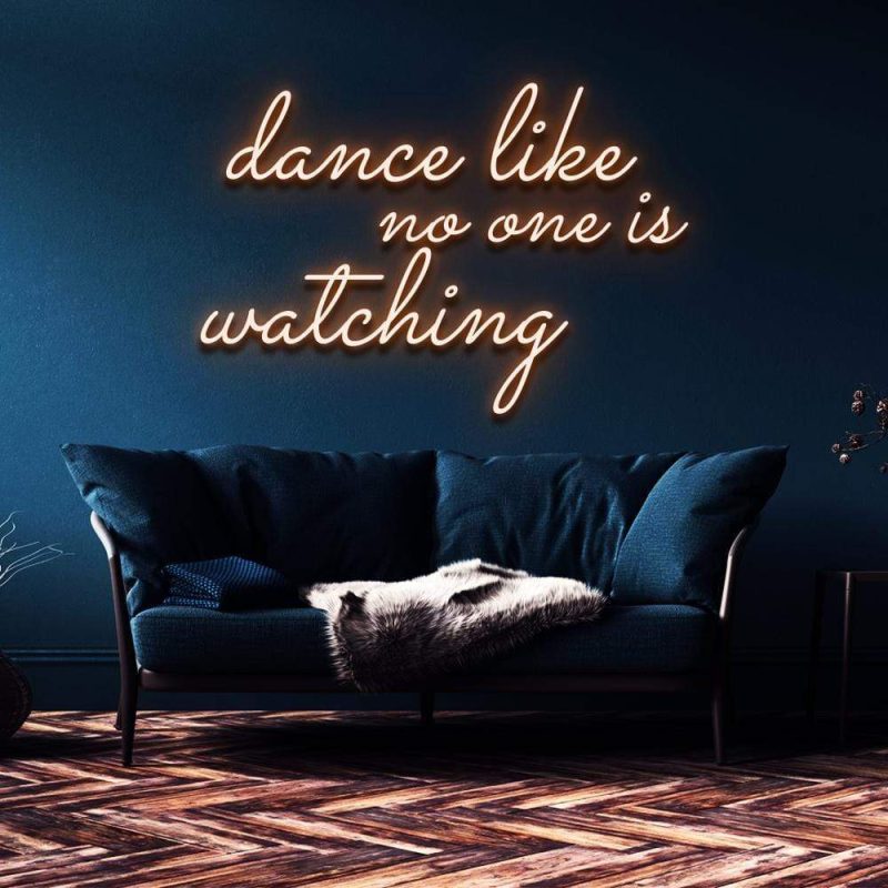 dance like no one orange watching neon sign warm light