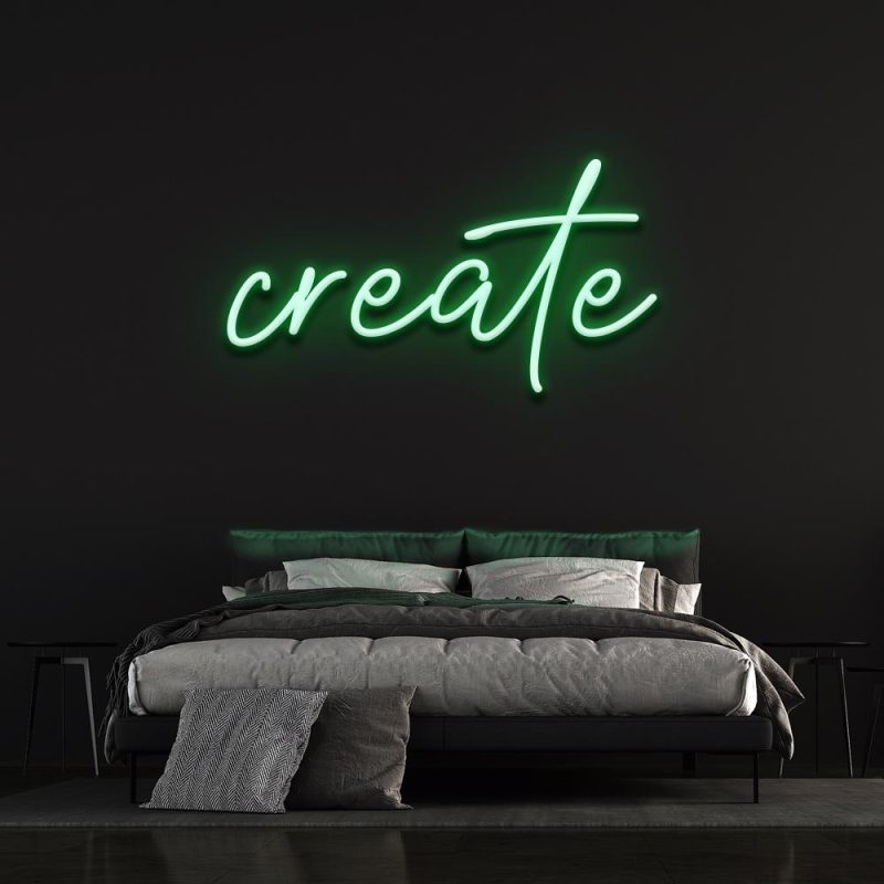 Green neon 'Create' sign highlighting a sleek bedroom design, adding a vibrant and motivational touch to the decor.