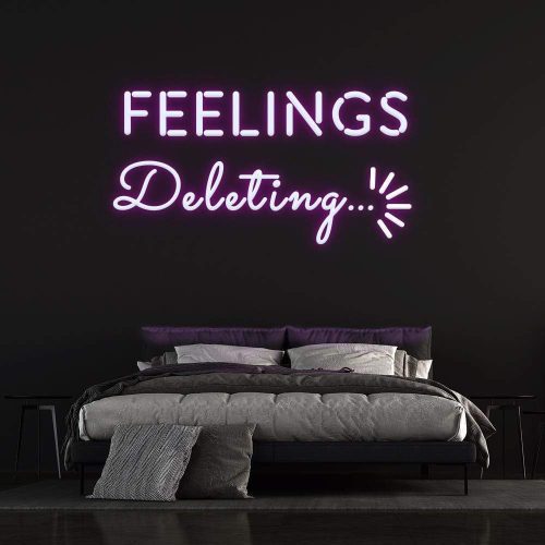 Purple neon sign reading 'Feelings Deleting' displayed above a modern bed on a black wall, ideal for bedroom decor.